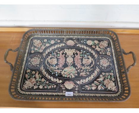 A large brass bound two handled tray having highly decorated Romanesque ceramic base, 71cm x 45.5cm