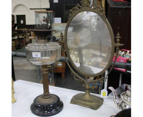 Brass framed dressing table mirror and Victorian oil lamp base 