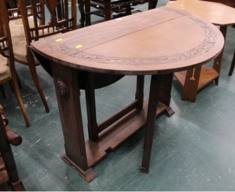Arts &amp; Crafts style oak gate leg table with carved edge, height 75 cm, diameter 96 cm