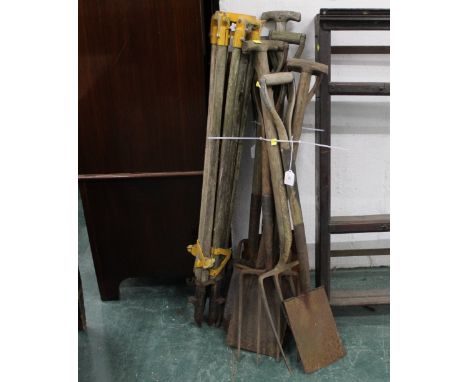 Garden tools, spades, forks and some surveyors levels etc