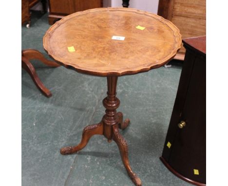 Walnut tripod occasional table, with piecrust edge and quarter veneered top raised on turned column with carved knees and fee