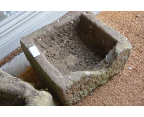 A small square weathered sandstone garden trough. c. 30cm square