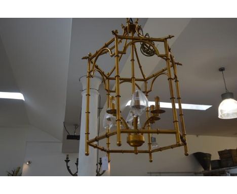 A large gilt-metal bamboo cast six-light hanging hall lantern. 84cm by 59cm