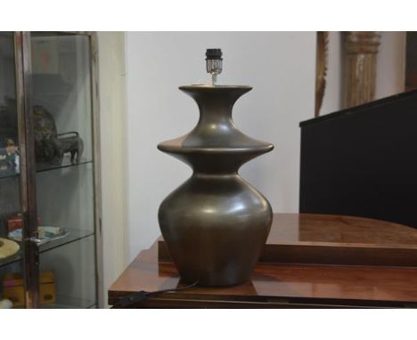 A contemporary table lamp of shaped baluster form with metallic glaze. 52cm excluding fitting.