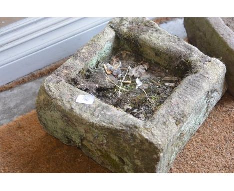 A small square weathered garden sandstone trough. c. 34cm square