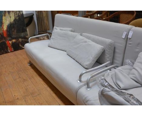 An Italian contemporary sofa bed by BBB Emmebonacina, in grey, with fold out seat and raised on white metal legs, with four l