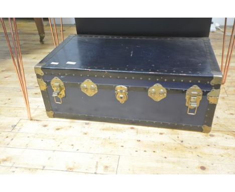 A brass-bound trunk, c. 1900, initialled to each end. 33cm by 92cm by 52cm