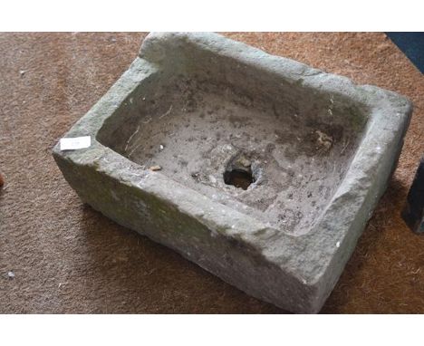 A rectangular weathered sandstone garden trough. 36cm by 50cm