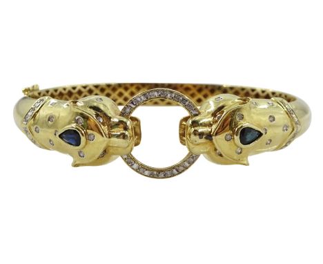 14ct gold sapphire and diamond panther hinged bangle, each head set with a pear shaped sapphire and round brilliant cut diamo