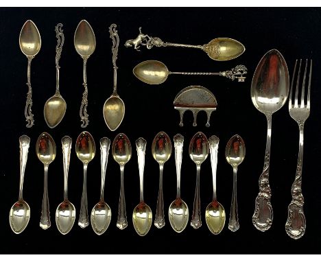 Set of twelve German 800 standard silver coffee spoons initialled 'R', spoon and fork by Stork with rococo stems and seven ot