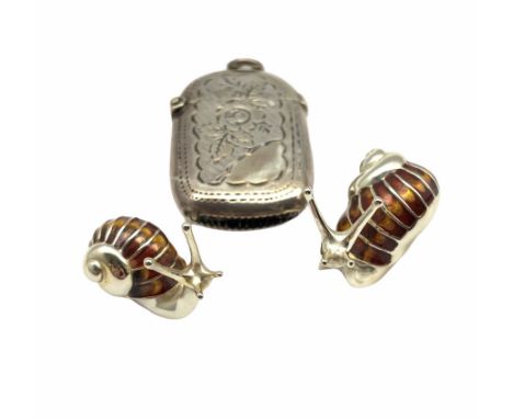 Pair of graduated silver and brown/amber enamel snails, larger L3cm London 2001 Maker Mappin and Webb, and an engraved silver