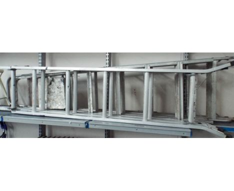 Two folding aluminium stepladders,a small multi purpose ladder and a small step up 