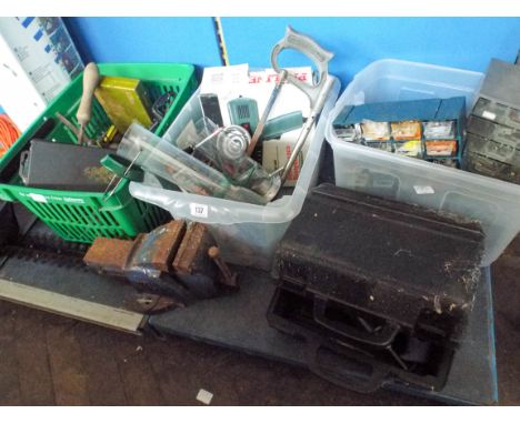 A quantity of old tools, tool boxes a vice, electric hedge trimmer, pressure spray, head gun etc  