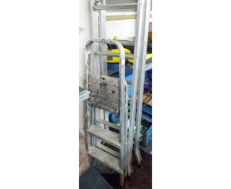A pair of step ladders and an aluminium ladder (converts to steps)
