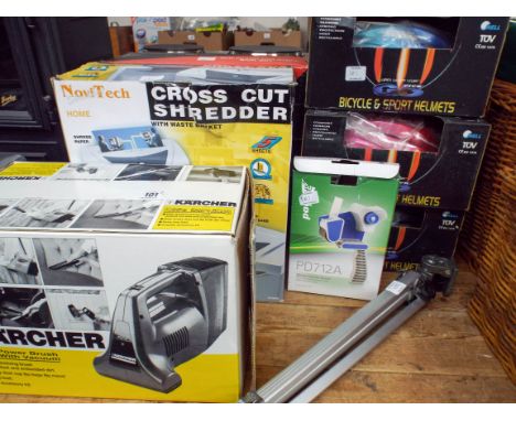 A copper bottomed wok set, a cross cut paper shredder a Karcher mini power brush, a tripod Cart and sealer and three bike hel