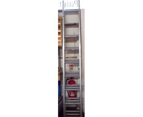 A 9 rung triple extending aluminium ladder  