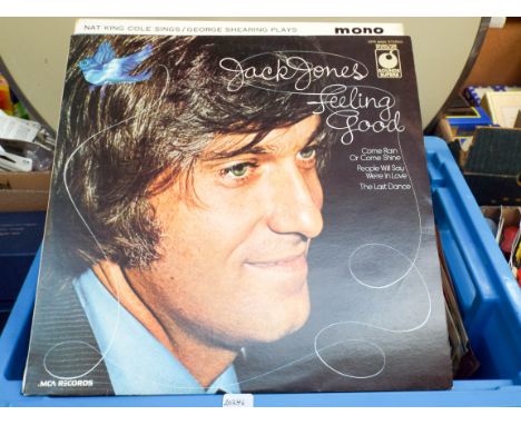 A quantity of LP record, some single records, an MP3 player and an old Walkman 