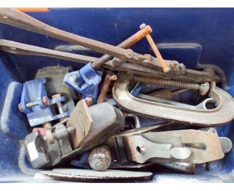 A box of old tools to include hand planes, vices etc and an as new Morso framing vice 