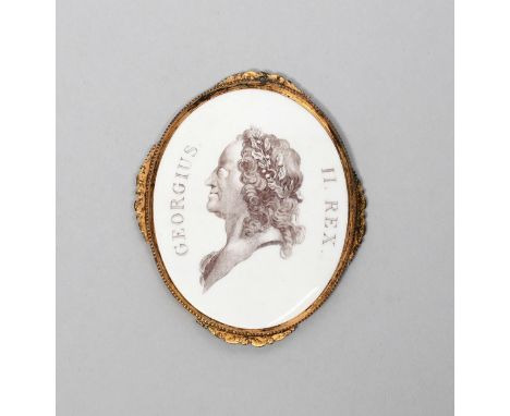 GEORGE II A Battersea enamel oval portrait plaque, c.1755, engraved by Ravenet and printed in manganese with a Classical head
