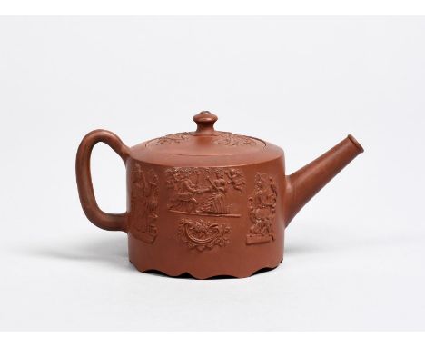 1761 MARRIAGE AND CORONATION OF GEORGE III AND QUEEN CHARLOTTE A Staffordshire redware teapot and cover, c.1761, the squat cy