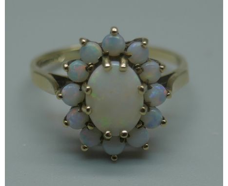 A 9ct gold and opal cluster ring, 2.2g, M 