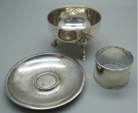 A Norwegian silver dish, an Arts and Crafts silver napkin ring and a silver salt with three hoof feet, 115g 