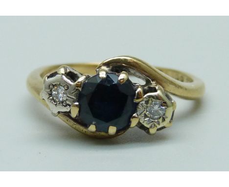 A 9ct gold, sapphire and diamond three stone ring, 2.7g, L 