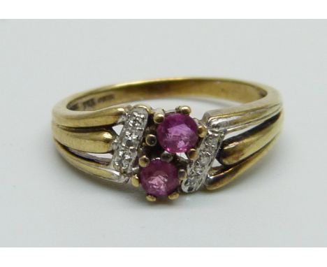 A yellow metal, ruby and diamond ring, marked 333, 2.4g, M/N 