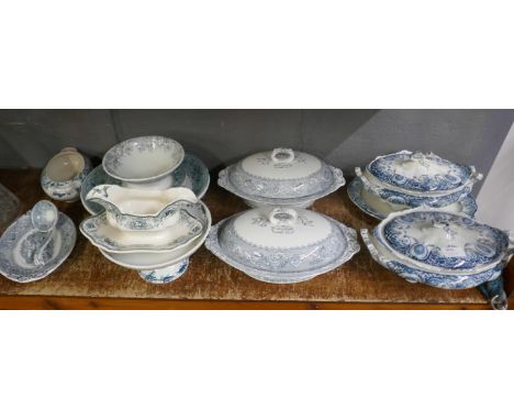 A collection of blue transferware table wares including Davenport Rhine pattern tureens, ladle, J. Kent tureens, Mason's, etc