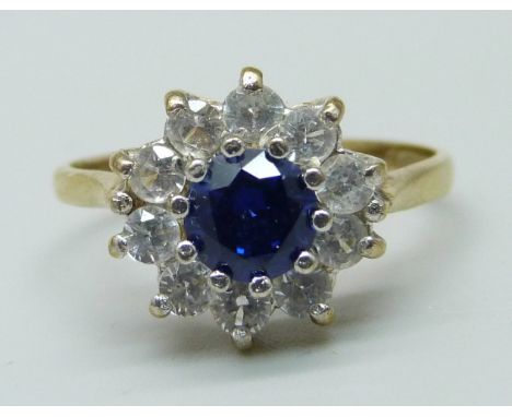 A 9ct gold, blue and white cluster ring, 2.1g, M/N 