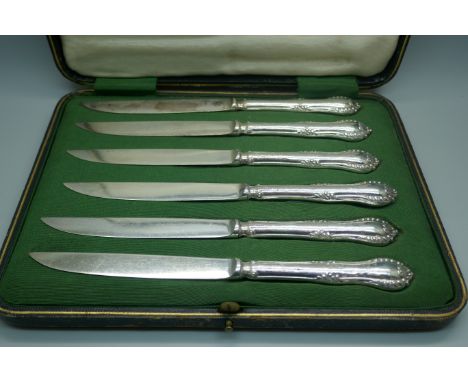 A cased set of six dessert knives with silver handles, Mappin &amp; Webb, Sheffield 1911 