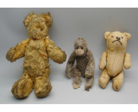 Two small vintage Teddy bears, including one Steiff and a small toy monkey 
