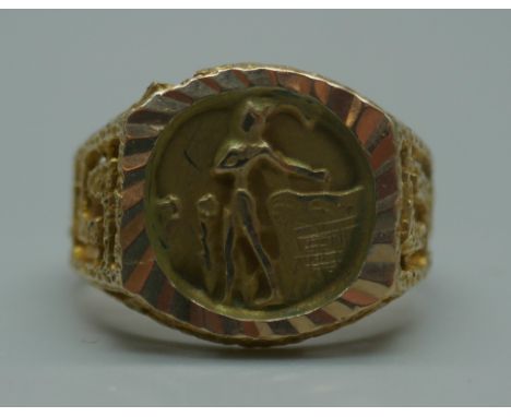A yellow metal ring, stamped 585, 3.8g, Q 