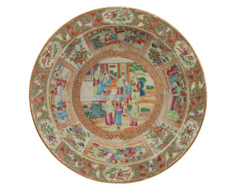 A CANTONESE FAMILLE ROSE BASIN Qing, decorated with polychrome enamel panels of figures, flowers, birds and butterflies, 41cm