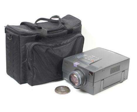 An Epson EMP-7100 LCD projector. Together with cables and carry bag.