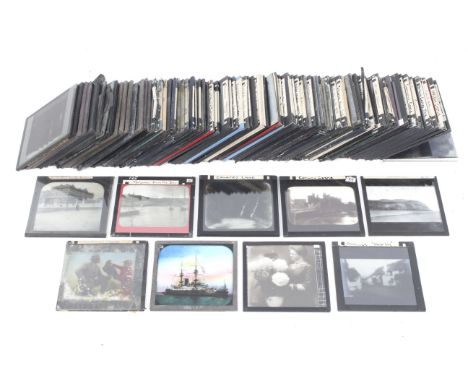 An assortment of glass magic lantern and photographic slides. Featuring maritime scenes, 'Porlock Hill', 'Blossom Time', 'Lec