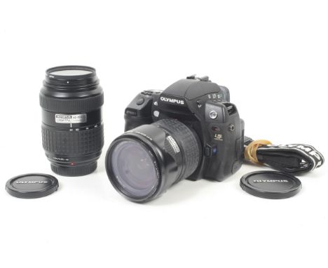 An Olympus E3 Digital SLR camera outfit. With two lenses; an Olympus 14-55mm f2.8-3.5 Zuiko Digital and an Olympus 40-150mm f