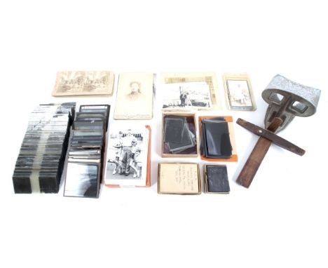 An assortment of Victorian and later photographs of a variety of formats. To include Magic Lantern slides, card and glass pla