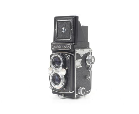 A Yashica 635 6x6 medium format TLR camera. Serial No. ST 2121015. With a Yashikor 80mm f3.5 taking lens. Shutter fires but a