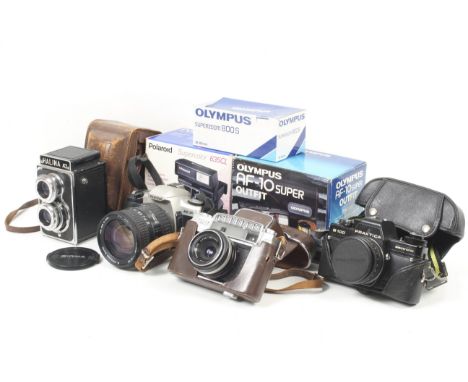 An collection of film cameras. To include a Pentax MZ-30 with a Sigma 28-200mm f3.5-5.6 lens, a Praktica B100 electronic with