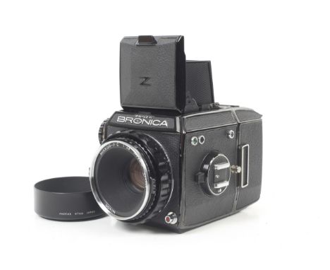 A Zenza Bronica EC 6x6 medium format camera. Black. Serial No. CB 322918. With a Nikon 75mm f2.8 Nikkor-P.C lens, lens hood, 