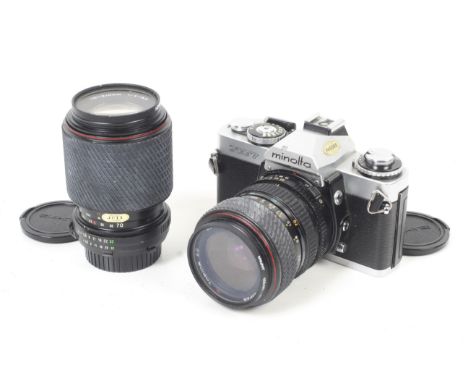 A Minolta XD7 35mm SLR camera outfit. With two lenses; a Tokina SD 28-70mm f3.5-4.5 and a Tokina SD 70-210mm f4-5.6. Chrome b