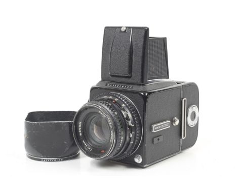 A Hasselblad 500CM 6x6 medium format SLR camera. Black. 1982. Serial No. RH 1266362. With a Carl Zeiss 80mm f2.8 Planar lens,