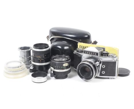 An Exakta VX1000 35mm SLR camera outfit. With three lenses; a Carl Zeiss Jena 50mm f2.8 Tessar, a Carl Zeiss Jena 135mm f4 So