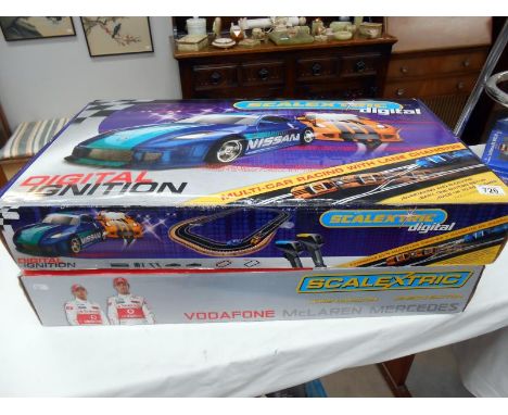 A Scalextric McLaren Mercedes, Lewis Hamilton & Jensen Button racing set & Scalextric digital ignition set