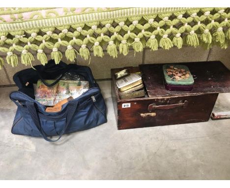 A vintage toolbox monogrammed DW and a bag of tools