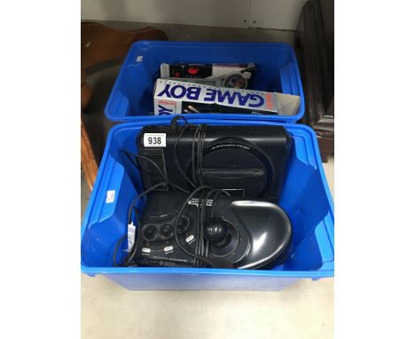 A Sega Megadrive, Sega Genesis Arcade power stick, a boxed Game Boy and accessories
