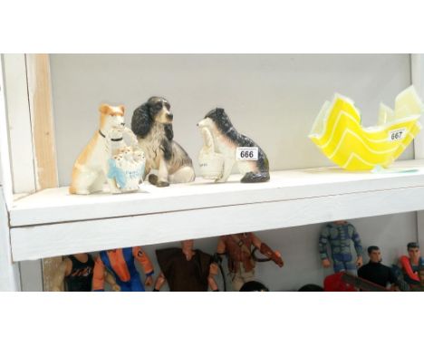 A Goebel spaniel & 2 family cares dog figurines