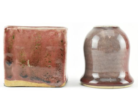 Two Qing dynasty brush washer / water ceramic pots. The water pot modelled in a bell shaped with copper-red ox-blood sang de 