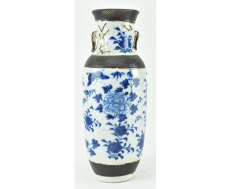 A late 18th early 19th century Qing dynasty Nanking crackle glazed blue and white ceramic vase. The baluster flared rim twin 